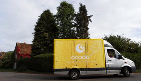 An Ocado delivery truck drives through Fingest in southern England October 8, 2013. REUTERS/Suzanne Plunkett An Ocado delivery truck drives through Fingest in southern England October 8, 2013. REUTERS/Suzanne Plunkett