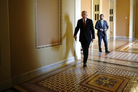 U.S. Senate Majority Leader Harry Reid (D-NV) (C) walks to address reporters after the weekly Republican caucus luncheon at the U.S. Capitol U.S. Senate Majority Leader Harry Reid (D-NV) (C) walks to address reporters after the weekly Republican caucus luncheon at the U.S. Capitol