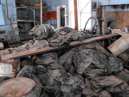 Radioactive oil filter socks found in an abandoned building in Noonan, North Dakota.
(Photo courtesy North Dakota Health Dept.) Radioactive oil filter socks found in an abandoned building in Noonan, North Dakota.
(Photo courtesy North Dakota Health Dept.)