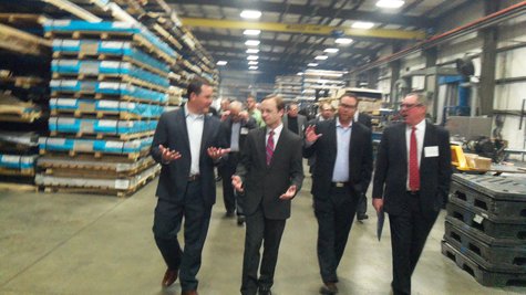 Calley Tours plant with other conferees. Calley Tours plant with other conferees.