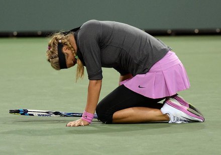Mar 7, 2014; Indian Wells, CA, USA; Victoria Azarenka (BLR) grimaces as she lands on her left ankle during her match against Lauren Davis (n Mar 7, 2014; Indian Wells, CA, USA; Victoria Azarenka (BLR) grimaces as she lands on her left ankle during her match against Lauren Davis (n