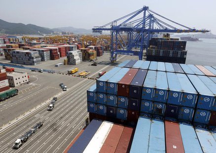 Trucks used to transport containers are seen at the Hanjin Shipping container terminal at the Busan New Port in Busan, about 420 km (261 mil Trucks used to transport containers are seen at the Hanjin Shipping container terminal at the Busan New Port in Busan, about 420 km (261 mil