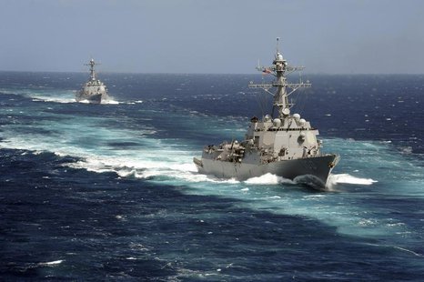 The Arleigh Burke-class guided-missile destroyers USS Kidd and USS Pinckney are seen en transit in the Pacific Ocean in this U.S. Navy pictu The Arleigh Burke-class guided-missile destroyers USS Kidd and USS Pinckney are seen en transit in the Pacific Ocean in this U.S. Navy pictu