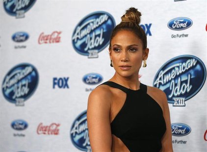 Singer and judge Jennifer Lopez poses at the party for the finalists of "American Idol XIII" in West Hollywood, California February 20, 2014 Singer and judge Jennifer Lopez poses at the party for the finalists of "American Idol XIII" in West Hollywood, California February 20, 2014