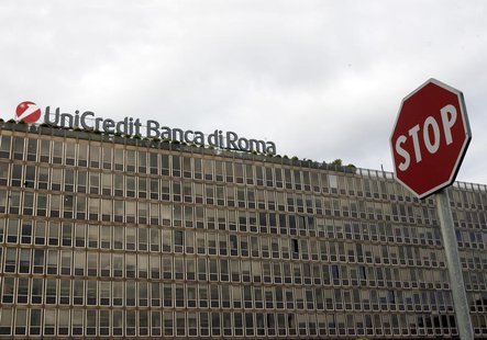 A stop sign is seen in front of the Unicredit building in Rome November 14, 2008. REUTERS/Giampiero Sposito A stop sign is seen in front of the Unicredit building in Rome November 14, 2008. REUTERS/Giampiero Sposito