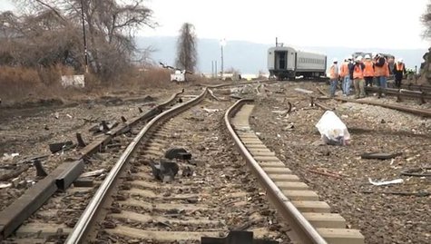 Twisted railroad tracks are seen at the site of a Metro-North train derailment in New York, in this still image from video taken by the Nati Twisted railroad tracks are seen at the site of a Metro-North train derailment in New York, in this still image from video taken by the Nati