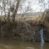 Water is seen draining into the Dan River from a coal ash pond at the site of the Duke Energy coal-fired power plant in Eden, North Carolina Water is seen draining into the Dan River from a coal ash pond at the site of the Duke Energy coal-fired power plant in Eden, North Carolina