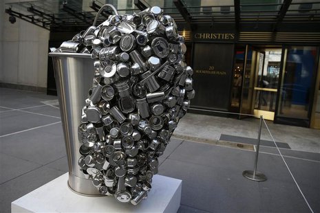 "Spill", a stainless steel vessel by Subodh Gupta is seen on display during ''The Spring 2-14 Sales of Asian Art Week" media preview at Chri "Spill", a stainless steel vessel by Subodh Gupta is seen on display during ''The Spring 2-14 Sales of Asian Art Week" media preview at Chri