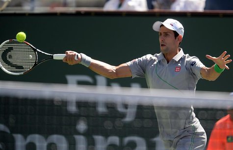 Mar 14, 2014; Indian Wells, CA, USA; Novak Djokovic (SRB) during his match against Julien Benneteau (not pictured) at the BNP Paribas Open a Mar 14, 2014; Indian Wells, CA, USA; Novak Djokovic (SRB) during his match against Julien Benneteau (not pictured) at the BNP Paribas Open a