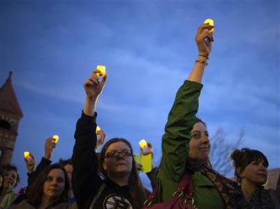 A candle light vigil two days after the 2013 Boston Marathon bombing. Fears remain that with a higher security presence, a danger remains for 2014.
REUTERS/Adrees Latif A candle light vigil two days after the 2013 Boston Marathon bombing. Fears remain that with a higher security presence, a danger remains for 2014.
REUTERS/Adrees Latif