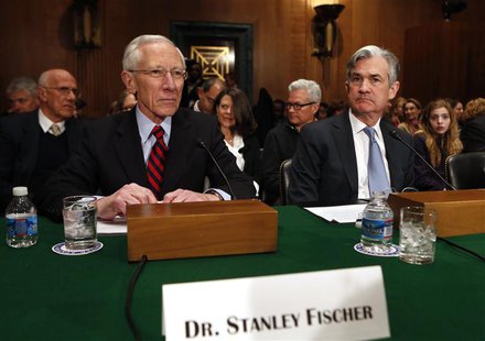 Stanley Fischer (L), the former chief of the Bank of Israel, prepares to testify before the Senate Banking Committee confirmation hearing on Stanley Fischer (L), the former chief of the Bank of Israel, prepares to testify before the Senate Banking Committee confirmation hearing on