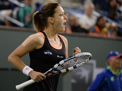 Mar 12, 2014; Indian Wells, CA, USA; Agnieszka Radwanska (POL) reacts during her match against Jelena Jankovic (not pictured) at the BNP Par Mar 12, 2014; Indian Wells, CA, USA; Agnieszka Radwanska (POL) reacts during her match against Jelena Jankovic (not pictured) at the BNP Par
