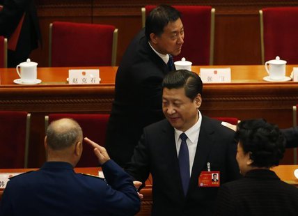 Xu Qiliang (L), vice Chairman of China's Central Military Commission, salutes China's President Xi Jinping (C) during the closing ceremony o Xu Qiliang (L), vice Chairman of China's Central Military Commission, salutes China's President Xi Jinping (C) during the closing ceremony o