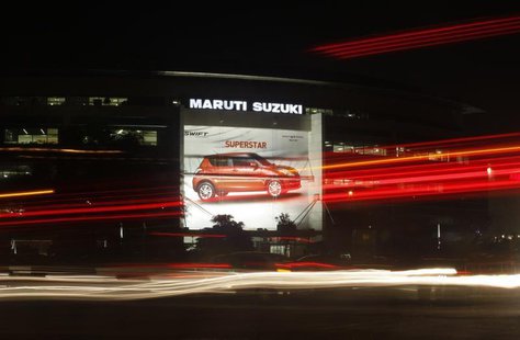 Traffic moves along a busy road in front of the Maruti Suzuki corporate office building in New Delhi July 24, 2013. REUTERS/Anindito Mukherj Traffic moves along a busy road in front of the Maruti Suzuki corporate office building in New Delhi July 24, 2013. REUTERS/Anindito Mukherj