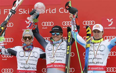 Men's giant slalom winner Ted Ligety of the U.S. is flanked by Austria's runner up Marcel Hirscher (L) and third placed Alexis Pinturault of Men's giant slalom winner Ted Ligety of the U.S. is flanked by Austria's runner up Marcel Hirscher (L) and third placed Alexis Pinturault of
