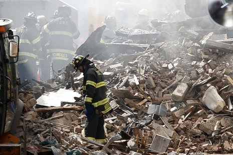 New York City emergency responders search through the rubble at the site of a building explosion in the Harlem section of New York, March 13 New York City emergency responders search through the rubble at the site of a building explosion in the Harlem section of New York, March 13
