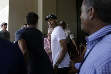 Former Yankees closer pitcher Mariano Rivera (C) is seen during a visit with the New York Yankees team at the Panama Canal in Panama City Ma Former Yankees closer pitcher Mariano Rivera (C) is seen during a visit with the New York Yankees team at the Panama Canal in Panama City Ma