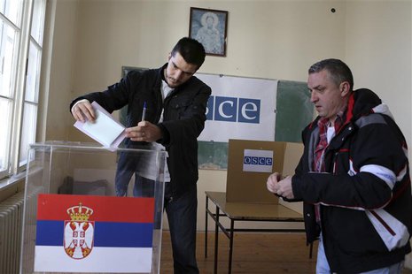 People cast their votes at a polling station during Serbian elections in Kosovo's town of Mitrovica March 16, 2014. REUTERS/Bojan Slavkovic People cast their votes at a polling station during Serbian elections in Kosovo's town of Mitrovica March 16, 2014. REUTERS/Bojan Slavkovic