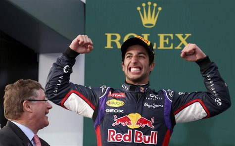 Red Bull Formula One driver Daniel Ricciardo of Australia (R) celebrates finishing second in the Australian F1 Grand Prix at the Albert Park Red Bull Formula One driver Daniel Ricciardo of Australia (R) celebrates finishing second in the Australian F1 Grand Prix at the Albert Park
