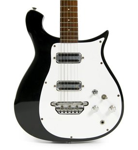 George Harrison's black-and-white 1962 Rickenbacker 425 electric guitar is shown in this handout photo provided by Julien's Auctions March 1 George Harrison's black-and-white 1962 Rickenbacker 425 electric guitar is shown in this handout photo provided by Julien's Auctions March 1