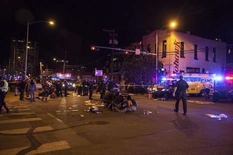 Patients who were struck by a vehicle on Red River Street during the SXSW festival are assisted by paramedics and bystanders in downtown Aus Patients who were struck by a vehicle on Red River Street during the SXSW festival are assisted by paramedics and bystanders in downtown Aus