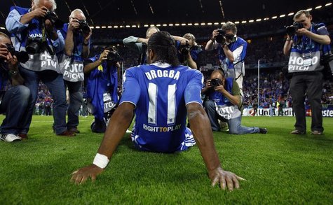 Photographers take pictures of Chelsea's Didier Drogba after their Champions League final soccer match against Bayern Munich at the Allianz Photographers take pictures of Chelsea's Didier Drogba after their Champions League final soccer match against Bayern Munich at the Allianz