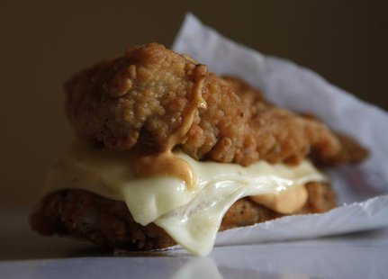 A KFC "Double Down" sandwich, consisting of bacon, cheese and a special sauce in between two slabs of fried chicken, is seen in Montreal Oct A KFC "Double Down" sandwich, consisting of bacon, cheese and a special sauce in between two slabs of fried chicken, is seen in Montreal Oct