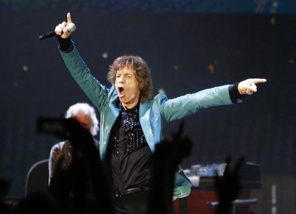 Mick Jagger of the Rolling Stones performs during their 14 on Fire concert at Marina Bay Sands in Singapore in this March 15, 2014 file phot Mick Jagger of the Rolling Stones performs during their 14 on Fire concert at Marina Bay Sands in Singapore in this March 15, 2014 file phot