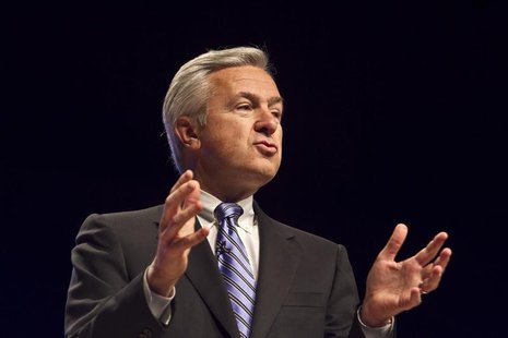 Wells Fargo Chief Executive Officer John Stumpf speaks to employees while celebrating the completion the company's conversion from Wachovia Wells Fargo Chief Executive Officer John Stumpf speaks to employees while celebrating the completion the company's conversion from Wachovia