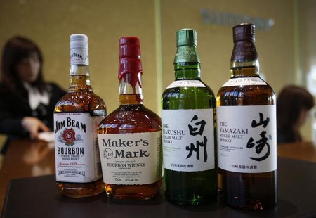Bottles of Suntory Holding's Yamazaki (R) and Hakushu (2nd R) whiskies are displayed with Beam Inc's Jim Beam (L) and Maker's Mark bourbon a Bottles of Suntory Holding's Yamazaki (R) and Hakushu (2nd R) whiskies are displayed with Beam Inc's Jim Beam (L) and Maker's Mark bourbon a