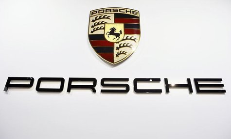 The Porsche logo is pictured during the 2013 Los Angeles Auto Show in Los Angeles, California November 20, 2013. REUTERS/Lucy Nicholson The Porsche logo is pictured during the 2013 Los Angeles Auto Show in Los Angeles, California November 20, 2013. REUTERS/Lucy Nicholson