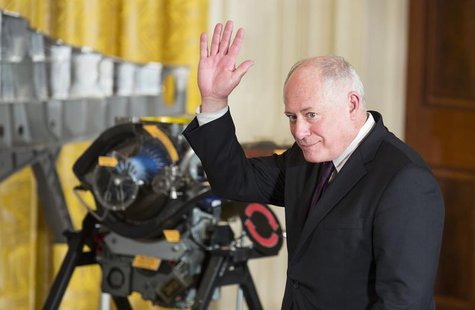 Governor of Illinois Pat Quinn waves as he is introduced by U.S. President Barack Obama during an event on manufacturing innovation institut Governor of Illinois Pat Quinn waves as he is introduced by U.S. President Barack Obama during an event on manufacturing innovation institut