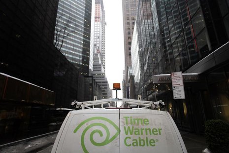 The Time Warner Cable logo is displayed on the back of a van in New York February 13, 2014. REUTERS/Joshua Lott The Time Warner Cable logo is displayed on the back of a van in New York February 13, 2014. REUTERS/Joshua Lott