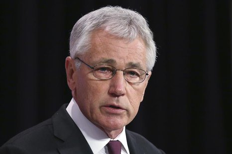 U.S. Secretary of Defense Chuck Hagel addresses a news conference during a NATO defence ministers meeting at the Alliance headquarters in Br U.S. Secretary of Defense Chuck Hagel addresses a news conference during a NATO defence ministers meeting at the Alliance headquarters in Br