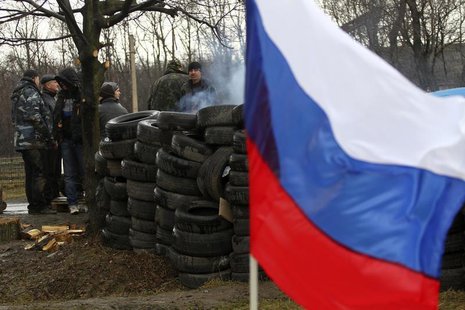 Members of a pro-Russian self-defence unit gather at a check point in Gorlovka in the Donetsk region, March 19, 2014. REUTERS/Stringer Members of a pro-Russian self-defence unit gather at a check point in Gorlovka in the Donetsk region, March 19, 2014. REUTERS/Stringer