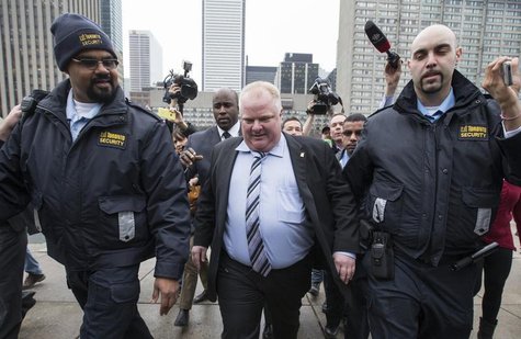 Toronto Mayor Rob Ford walks to City Hall in a media scrum in Toronto, March 19, 2014. REUTERS/Mark Blinch Toronto Mayor Rob Ford walks to City Hall in a media scrum in Toronto, March 19, 2014. REUTERS/Mark Blinch