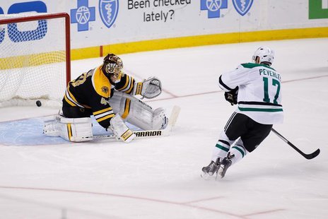 Nov 5, 2013; Boston, MA, USA; Dallas Stars center Rich Peverley (17) scores a goal on Boston Bruins goalie Tuukka Rask (40) during the shoot Nov 5, 2013; Boston, MA, USA; Dallas Stars center Rich Peverley (17) scores a goal on Boston Bruins goalie Tuukka Rask (40) during the shoot