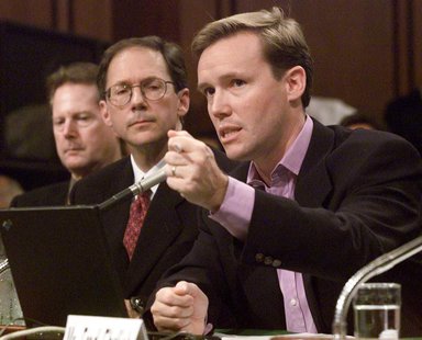 Michael Robertson (R), CEO of MP3.com, testifies before a Senate Judiciary committee on Capital Hill on the future of digital music, July 11