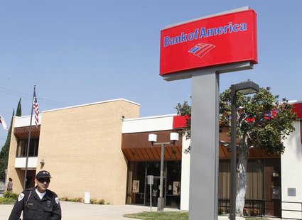 A security guard patrols outside a Bank of America office in Burbank, California August 19, 2011. REUTERS/Fred Prouser A security guard patrols outside a Bank of America office in Burbank, California August 19, 2011. REUTERS/Fred Prouser