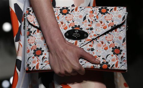 A model presents a creation from the Mulberry Spring/Summer 2014 collection during London Fashion Week September 15, 2013. REUTERS/Suzanne P A model presents a creation from the Mulberry Spring/Summer 2014 collection during London Fashion Week September 15, 2013. REUTERS/Suzanne P