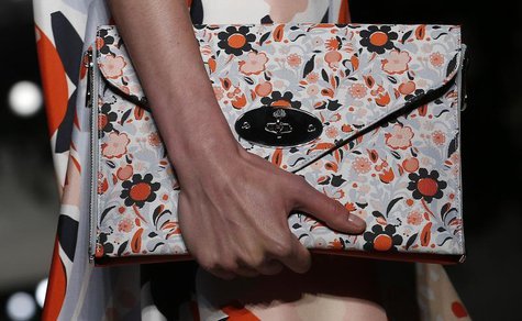 A model presents a creation from the Mulberry Spring/Summer 2014 collection during London Fashion Week September 15, 2013. REUTERS/Suzanne P A model presents a creation from the Mulberry Spring/Summer 2014 collection during London Fashion Week September 15, 2013. REUTERS/Suzanne P