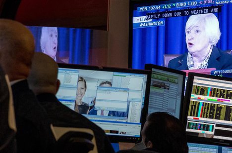 A screen displays a news conference by Federal Reserve Chair Janet Yellen as traders work on the floor of the New York Stock Exchange March A screen displays a news conference by Federal Reserve Chair Janet Yellen as traders work on the floor of the New York Stock Exchange March