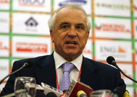 Leandro Negre, President of the International Hockey Federation (FIH), speaks as journalists walk out of a news conference venue in New Delh Leandro Negre, President of the International Hockey Federation (FIH), speaks as journalists walk out of a news conference venue in New Delh