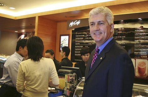 Tim Fenton, president of McDonald's Asia-Pacific, Middle East and Africa unit, poses at a McCafe restaurant in Hong Kong November 7, 2006. R Tim Fenton, president of McDonald's Asia-Pacific, Middle East and Africa unit, poses at a McCafe restaurant in Hong Kong November 7, 2006. R