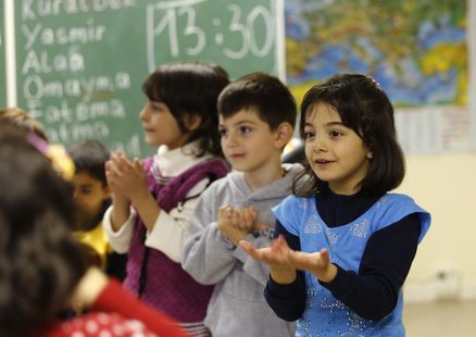 Syrian refugee children learn the German language in a school at the 'Friedland' refugee camp in the central German village of Friedland Sep Syrian refugee children learn the German language in a school at the 'Friedland' refugee camp in the central German village of Friedland Sep