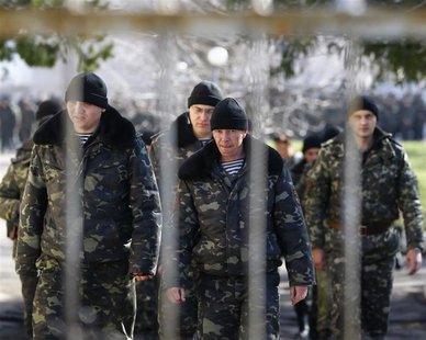 Ukrainian soldiers walk inside a military base in Perevalnoye, near the Crimean city of Simferopol, March 21, 2014. REUTERS/Shamil Zhumatov Ukrainian soldiers walk inside a military base in Perevalnoye, near the Crimean city of Simferopol, March 21, 2014. REUTERS/Shamil Zhumatov