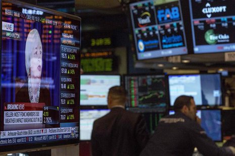 A screen displays a news conference by Federal Reserve Chair Janet Yellen as traders work on the floor of the New York Stock Exchange March A screen displays a news conference by Federal Reserve Chair Janet Yellen as traders work on the floor of the New York Stock Exchange March
