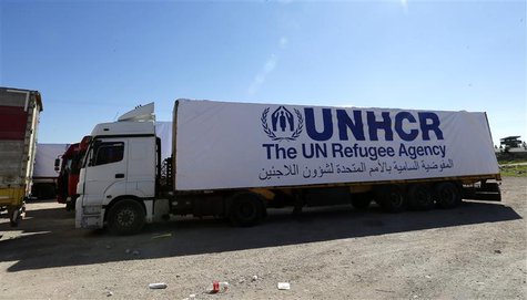 Trucks carrying humanitarian supplies wait in front of Turkey's Nusaybin border post in Mardin province March 20, 2014. REUTERS/Umit Bektas Trucks carrying humanitarian supplies wait in front of Turkey's Nusaybin border post in Mardin province March 20, 2014. REUTERS/Umit Bektas