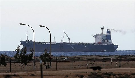 A North Korean-flagged tanker, the Morning Glory, is seen docked at the Es Sider export terminal in Ras Lanuf in this March 8, 2014 file pho A North Korean-flagged tanker, the Morning Glory, is seen docked at the Es Sider export terminal in Ras Lanuf in this March 8, 2014 file pho