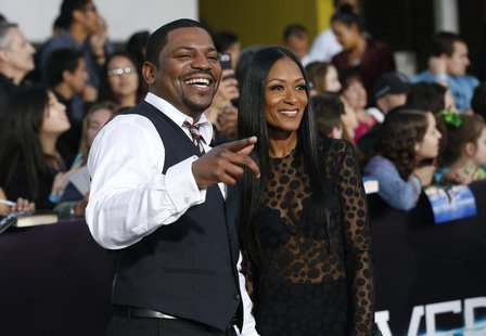Cast member Mekhi Phifer and his wife Reshelet Barnes pose at the premiere of "Divergent" in Los Angeles, California March 18, 2014. REUTERS Cast member Mekhi Phifer and his wife Reshelet Barnes pose at the premiere of "Divergent" in Los Angeles, California March 18, 2014. REUTERS